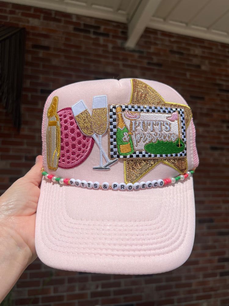 Putts & Prosecco Trucker hat